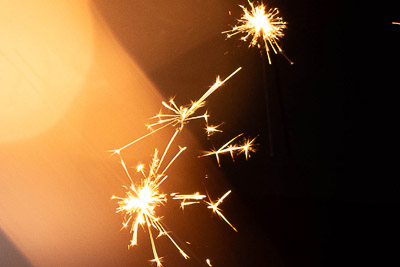 A close-up shot of the light sticks in the night.